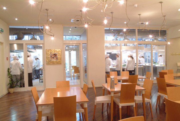 Apicius International School of hospitality, main dinning room overlooking the student kitchen